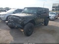 2015 Jeep Wrangler Unlimited — photo 2 of 16 | VIN 1C4BJWDG4FL569439