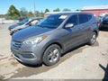 2018 Hyundai Santa Fe — photo 2 of 16 | VIN 5NMZT3LB9JH084740