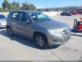 2011 Volkswagen Tiguan — photo 1 of 13 | VIN WVGAV7AX7BW559972