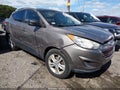 2012 Hyundai Tucson — photo 1 of 12 | VIN KM8JUCACXCU418870