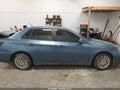 2009 Subaru Impreza — photo 13 of 17 | VIN JF1GE60639H500360
