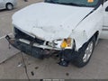 2006 GMC Envoy — photo 6 of 14 | VIN 1GKET16S666165427