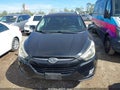 2015 Hyundai Tucson — photo 12 of 16 | VIN KM8JUCAG2FU044052