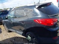 2015 Hyundai Tucson — photo 14 of 16 | VIN KM8JUCAG2FU044052