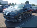 2016 Honda Pilot — photo 2 of 15 | VIN 5FNYF5H93GB044569