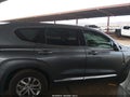 2019 Hyundai Santa Fe — photo 14 of 17 | VIN 5NMS33AD4KH009659