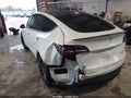 2022 Tesla Model Y — photo 3 of 18 | VIN 7SAYGDEFXNF535660