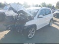 2014 Volkswagen Tiguan — photo 2 of 17 | VIN WVGBV3AX2EW008866