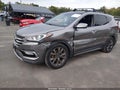 2017 Hyundai Santa Fe — photo 2 of 22 | VIN 5NMZWDLAXHH042012