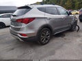 2017 Hyundai Santa Fe — photo 4 of 22 | VIN 5NMZWDLAXHH042012