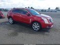 2015 Cadillac SRX — photo 1 of 18 | VIN 3GYFNDE34FS557480