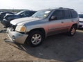 2002 GMC Envoy — photo 2 of 17 | VIN 1GKDS13S822431521