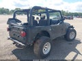 1997 Jeep Wrangler — photo 4 of 11 | VIN 1J4FY29P2VP407552