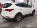2017 Hyundai Santa Fe — photo 4 of 16 | VIN 5XYZUDLB0HG402056