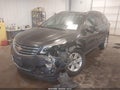 2014 Chevrolet Traverse — photo 2 of 16 | VIN 1GNKVHKD4EJ371390
