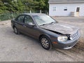 2002 Kia Optima — photo 1 of 14 | VIN KNAGD128325125461