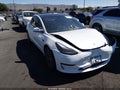 2023 Tesla Model 3 — photo 13 of 19 | VIN 5YJ3E1EA7PF563421
