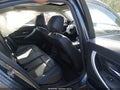 2013 BMW 3 Series — photo 8 of 16 | VIN WBA3B3C50DF530968