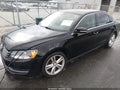 2014 Volkswagen Passat — photo 2 of 11 | VIN 1VWBT7A37EC034389