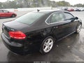 2014 Volkswagen Passat — photo 4 of 11 | VIN 1VWBT7A37EC034389
