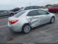 2018 Toyota Corolla — photo 4 of 16 | VIN 5YFBURHE1JP778283