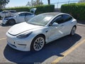 2022 Tesla Model 3 — photo 2 of 15 | VIN 5YJ3E1EB8NF274716