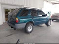 1999 Isuzu Rodeo — photo 4 of 12 | VIN 4S2CK58D7X4364659