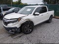 2017 Honda Ridgeline — photo 2 of 16 | VIN 5FPYK3F77HB028532