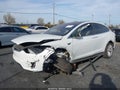 2020 Tesla Modelo X — photo 2 of 14 | VIN 5YJXCBE27LF283742
