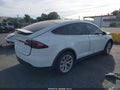 2020 Tesla Modelo X — photo 4 of 14 | VIN 5YJXCBE27LF283742