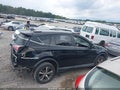 2018 Toyota RAV4 — photo 13 of 16 | VIN 2T3WFREV5JW424109