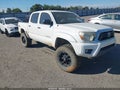 2012 Toyota Tacoma — photo 1 of 19 | VIN 5TFJU4GN1CX020738