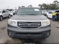 2012 Honda Pilot — photo 13 of 18 | VIN 5FNYF3H52CB041495