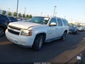 2011 Chevrolet Suburban — photo 14 of 19 | VIN 1GNSKJE30BR222863