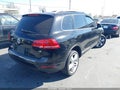 2013 Volkswagen Touareg — photo 4 of 16 | VIN WVGEF9BP2DD005925