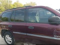 2006 GMC Envoy — photo 13 of 16 | VIN 1GKDS13S262209384