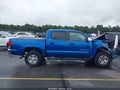2017 Toyota Tacoma — photo 13 of 16 | VIN 5TFAX5GN4HX095230
