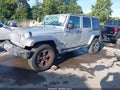 2009 Jeep Wrangler Unlimited — photo 2 of 17 | VIN 1J4GA59169L726908