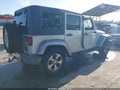 2009 Jeep Wrangler Unlimited — photo 4 of 17 | VIN 1J4GA59169L726908