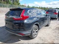 2019 Honda CR-V — photo 4 of 19 | VIN 2HKRW2H57KH662200