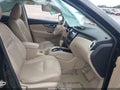 2015 Nissan Rogue — photo 5 of 17 | VIN 5N1AT2MTXFC927716
