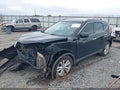 2015 Nissan Rogue — photo 6 of 17 | VIN 5N1AT2MTXFC927716