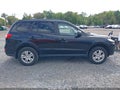 2012 Hyundai Santa Fe — photo 13 of 17 | VIN 5XYZGDABXCG125726