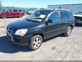 2009 Kia Sportage — photo 2 of 11 | VIN KNDJF724997564424