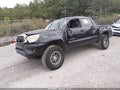 2014 Toyota Tacoma — photo 2 of 16 | VIN 5TFLU4EN8EX102383