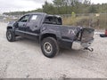 2014 Toyota Tacoma — photo 3 of 16 | VIN 5TFLU4EN8EX102383