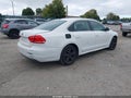 2013 Volkswagen Passat — photo 4 of 15 | VIN 1VWBP7A34DC073783