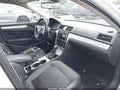 2013 Volkswagen Passat — photo 5 of 15 | VIN 1VWBP7A34DC073783