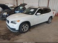 2015 BMW X1 — photo 2 of 11 | VIN WBAVM1C51FVW57602