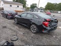 2016 Honda Civic — photo 3 of 17 | VIN 19XFC2F56GE240929